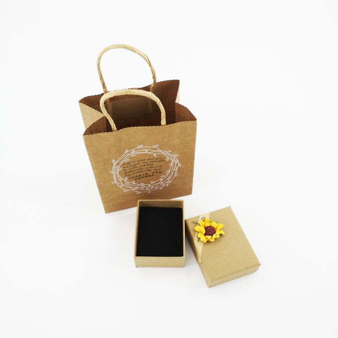 Os sacos de compras do papel do ofício de Brown imprimiram a superfície matte da laminação para o empacotamento da joia