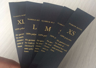 China Etiquetas feitas sob encomenda da etiqueta do preto do tipo do brilho com impressão de gravação de carimbo quente do logotipo fábrica