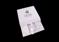 As caixas de presente de dobramento varejos da laminação da tampa vendem a varejo o logotipo branco do ouro de Rosa da fita fornecedor